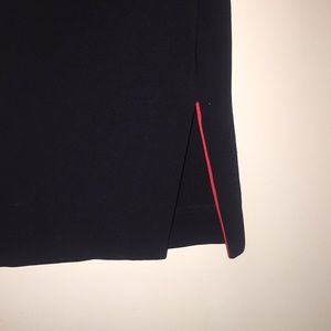 Classic black skirt with a hint of red